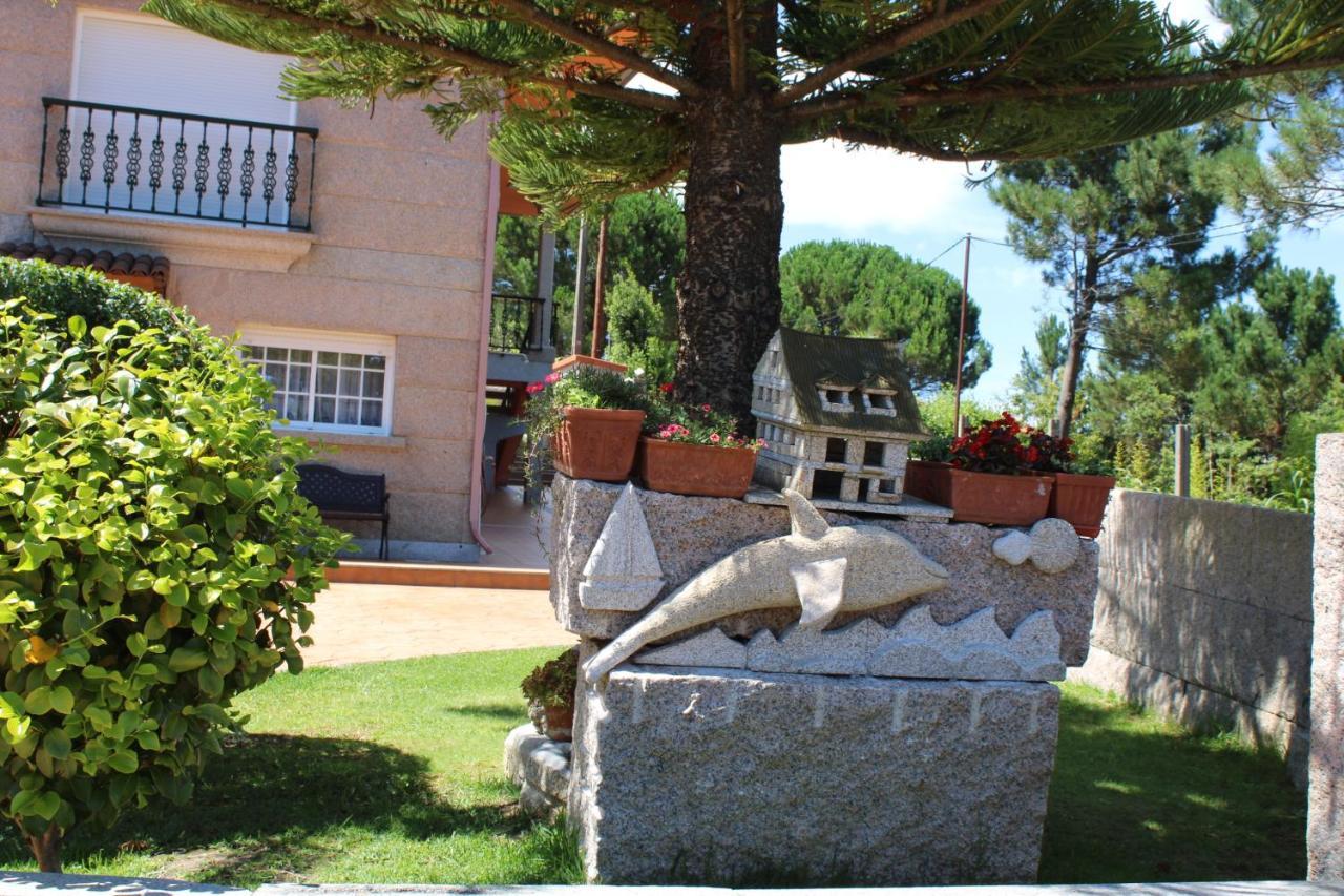 Apartamentos Os Cerros ポルトノボ エクステリア 写真