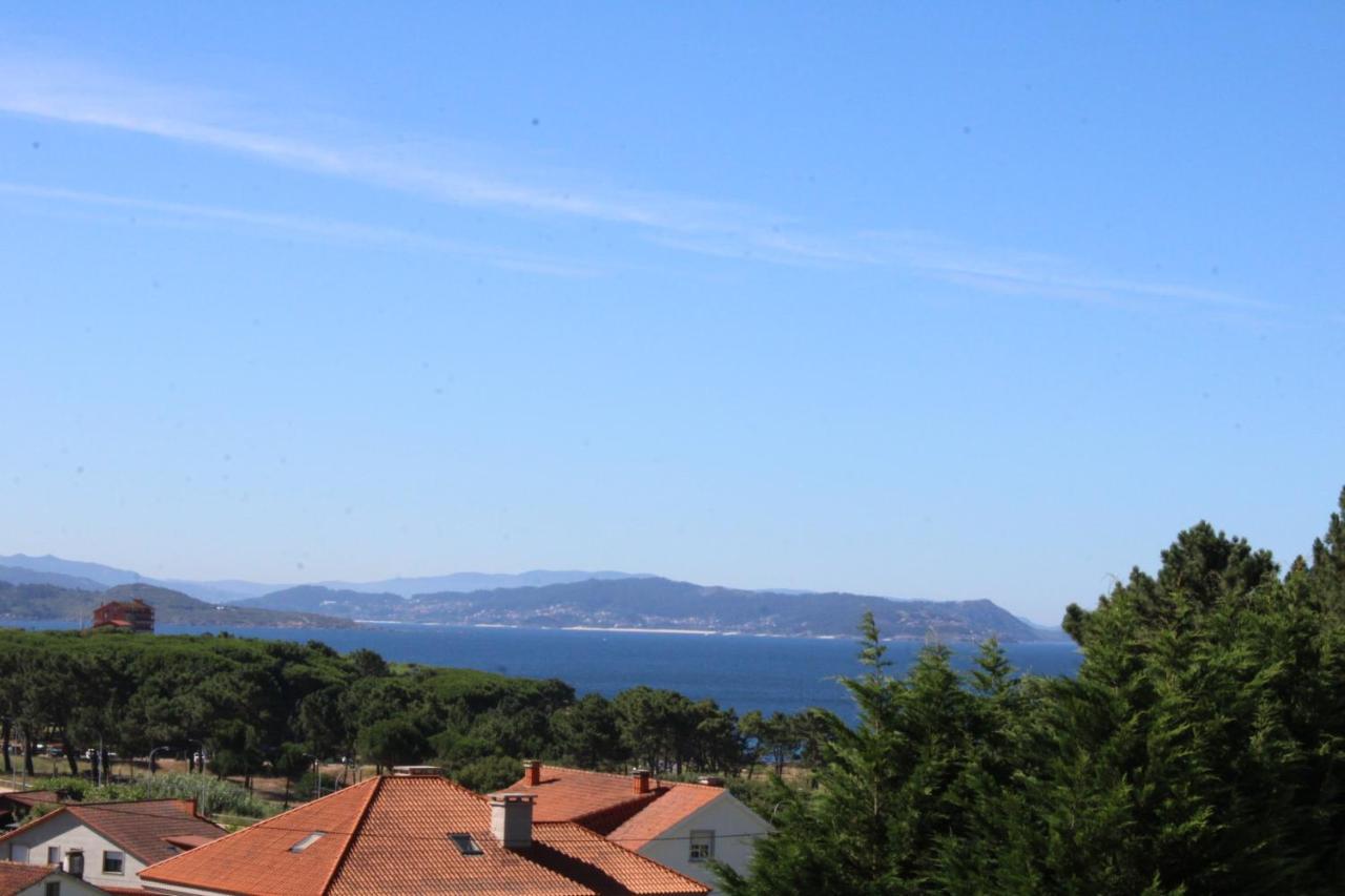 Apartamentos Os Cerros ポルトノボ エクステリア 写真